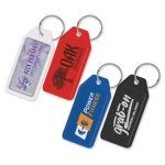Four budget key rings in various colours: red, blue, black, and white, each featuring a logo or branding.