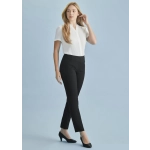 A model wearing black slim leg pants paired with a white blouse, posing against a light blue background.