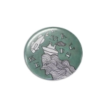 A 58mm round button badge with a green background and a graphic design featuring a ship and abstract lines.