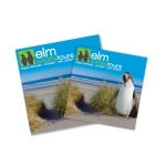 Two square cleaning cloths featuring a coastal scene with grass and a penguin, predominantly in blue and green tones.