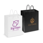 A medium laminated carry bag in white with purple logo and a black bag with gold logo, featuring sturdy handles.