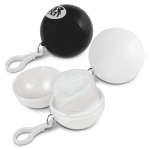 A black and white ball-shaped container with a clip, featuring a logo, that holds a raincoat inside.