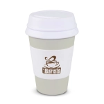 A stress coffee cup in light green and white with a branded sleeve and a white lid.