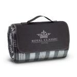 A folded picnic blanket in grey and green plaid, featuring a black carrying strap and a logo on the front.