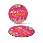 A circular fridge magnet featuring colourful nail art designs, with a branding logo and contact details on a pink background.