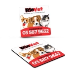 A square fridge magnet featuring illustrations of a dog and a cat, with a red and white colour scheme and a logo.