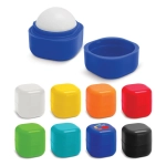 A collection of colourful lip balm containers, including white, blue, yellow, orange, turquoise, green, and black options.
