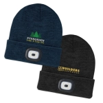 A navy beanie with a headlamp and logo, alongside a black beanie with a headlamp and another logo.