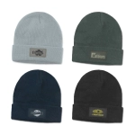 A collection of four beanies in grey, dark green, navy, and black, each featuring a different patch or logo.