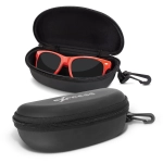 A black hard-shell sunglass case with a zipper, housing bright red sunglasses inside.