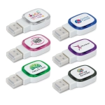 A collection of six colourful 4GB flash drives in various shapes with branding on each.
