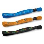 Three event wristbands in blue, orange, and black, featuring a logo and colourful graphic designs.
