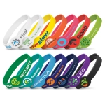 A collection of silicone wristbands in various colours, featuring logos and designs, displayed in an organised arrangement.