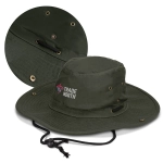 An olive green oilskin wide brim hat with ventilation holes and a chin strap, featuring a logo.