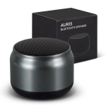 Auris Bluetooth speaker in sleek grey, with a rounded design, alongside its black packaging featuring branding.
