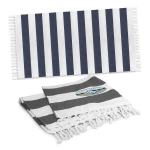 Striped cotton towels in navy blue and white, featuring fringe edges and a logo, displayed together.
