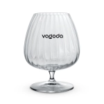 A clear glass cognac glass with a ribbed design and a stem, featuring a logo.