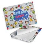 A full-colour tea towel featuring playful children's illustrations on a light background, with a logo present.