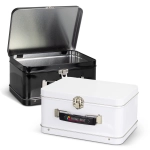 A black and a white tin lunch box with metal clasps and an interior lining, both featuring logos on the exterior.