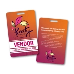 A vibrant orange ID card with floral design, featuring details for a vendor at a beauty convention.