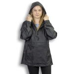 A woman wearing a black windbreaker with a hood, featuring an adjustable design and a front pocket.