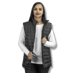 A woman models a black TRENDSWEAR Frazer women's puffer vest, featuring a zip front and high collar.