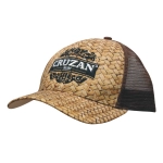 A straw-patterned cap with a dark mesh back, featuring a central logo.