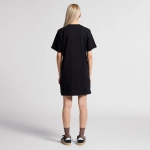 A black oversized dress with short sleeves, shown from the back, featuring a casual fit and a simple design.
