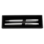 A black cardboard box containing two silver pens secured with a black holder.