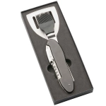 A BBQ multi tool featuring a spatula, brush, and corkscrew, presented in a sleek black box.