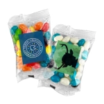 Two transparent bags containing colourful jelly beans in various shades, including orange, blue, and white. Each bag has a logo.