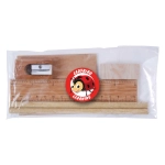 A clear package containing a wooden ruler, two wooden sticks, a sharpener, and an eraser featuring a cartoon character.
