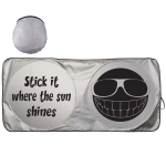 A silver sunshade featuring a smiley face and humorous text, folded in a circular shape.