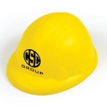 A yellow hard hat stress reliever with the logo "CSC GROUP" printed on it.