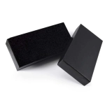 A black gift box set with a sleek exterior. One box features a textured top, while the other has a smooth finish.