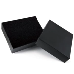 A black gift box with a removable lid, featuring a textured interior and a smooth exterior.