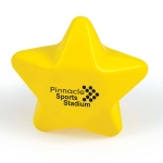 A yellow star-shaped stress reliever with "Pinnacle Sports Stadium" printed on it.