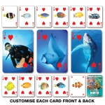 Playing cards featuring aquatic images in vibrant colors, including fish and a diver, with heart suits prominently displayed.