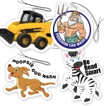 Four car deodorisers in various shapes: a yellow skid steer, a cartoon deity, a dog, and a zebra. Each has a unique design.
