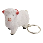 A white sheep-shaped key ring featuring red accents, attached to a metal key chain.