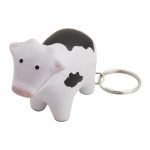 A white and black cow-shaped key ring with a metal keychain. It features a cartoonish design.