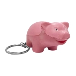 A pink pig-shaped key ring with a silver keychain, designed as a stress-relief item.