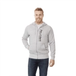 A grey fleece zip hoodie for men, featuring a logo and a kangaroo pocket. Worn by a smiling man with a casual look.