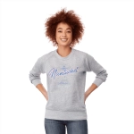 A woman with curly hair wears a grey fleece crew jumper with a design featuring the word "Nantucket."