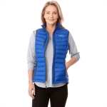 A woman models a vibrant blue down vest with a zippered front, featuring side pockets and a logo.