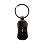 A gunmetal keychain featuring a rounded design and a split ring for attaching keys, with a branding logo.