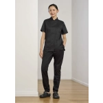 A black women's chef uniform featuring a short-sleeve top and jogger pants, paired with black clogs.