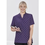 A women's tunic in dark purple featuring a daisy print design, with a short collar and short sleeves.