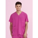A unisex pink V-neck scrub top displayed on a model, featuring a pocket on the front and an overall bright colour.
