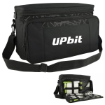 A black picnic bag with a shoulder strap, featuring compartments for utensils and tools, and a logo on the front.